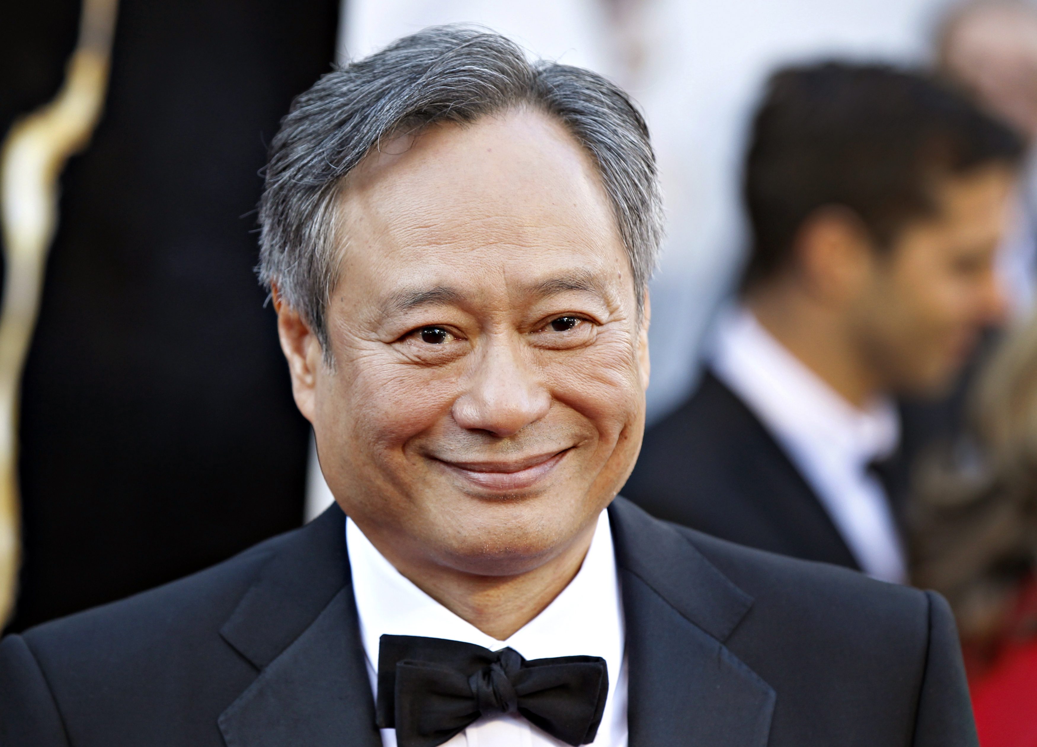 Ang Lee, best director nominee for his film "Life of Pi", arrives at the 85th Academy Awards in Hollywood