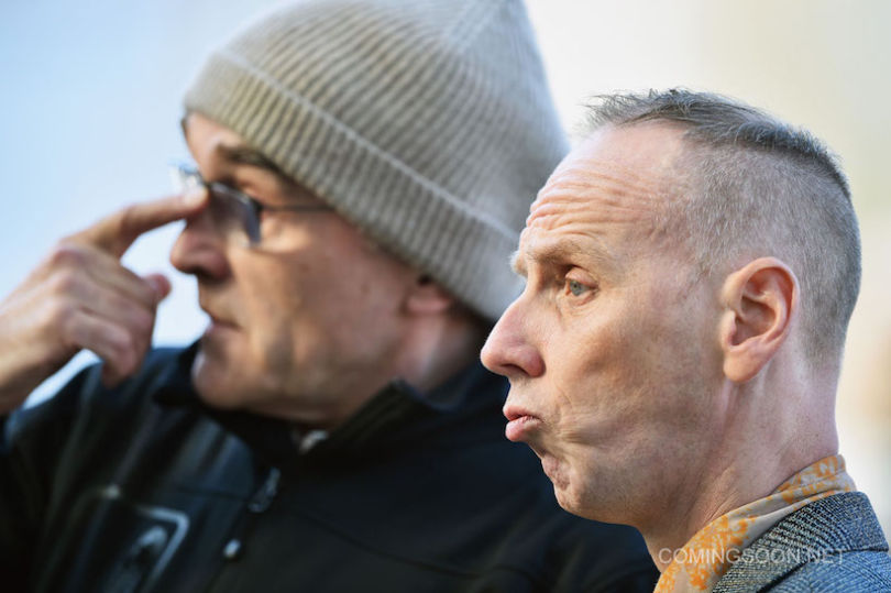 EDINBURGH, SCOTLAND - MAY 11:  Director Danny Boyle and actor Ewan Bremner, on the set of the Trainspotting  film sequel in Muirhouse shopping centre on May 11, 2016 in Edinburgh, Scotland. The long awaited Trainspotting 2 is being filmed in Edinburgh and Glasgow, 20 years after the original was released it will also see the cast from the first film returning including Ewan McGregor, Jonny Lee Miller and Robert Carlyle.  (Photo by Jeff J Mitchell/Getty Images)