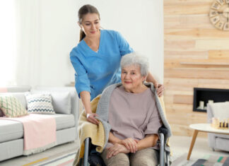 nurse covering elderly